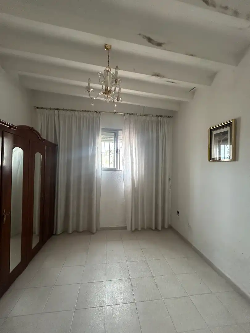 Dormitori de Casa adosada en venda en Vélez-Málaga amb Terrassa, Traster i Moblat
