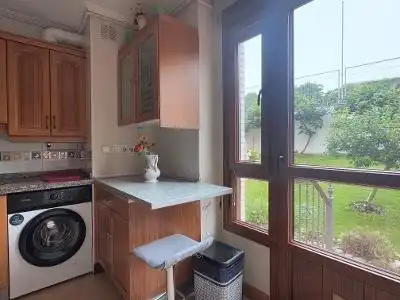 Küche von Wohnung zum Verkauf in Gozón mit Heizung, Privatgarten und Terrasse