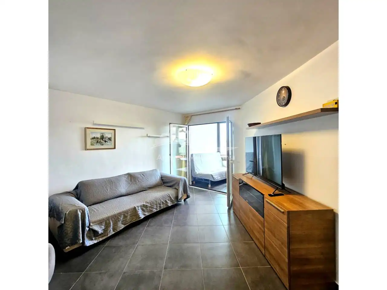 Sala de estar de Piso en venta en Castell d'Aro, Platja d'Aro i s'Agaró con Aire acondicionado y Terraza