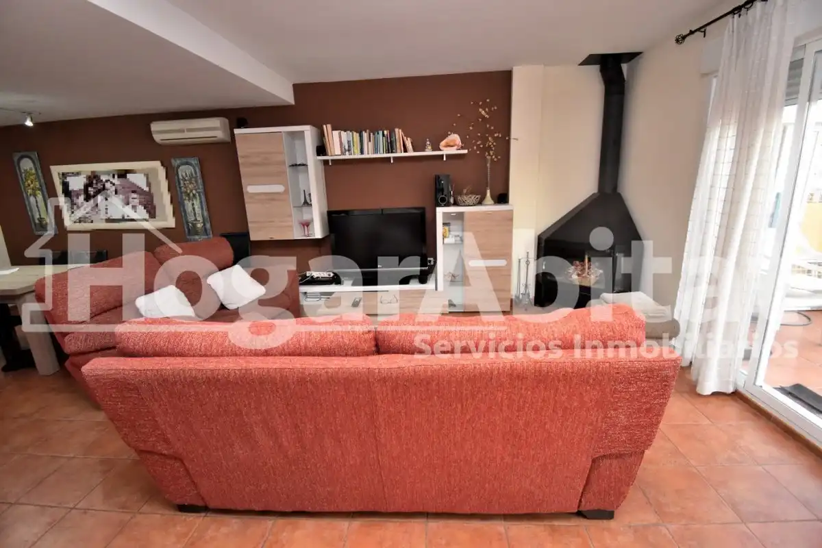 Sala de estar de Casa adosada en venta en Burriana / Borriana con Jardín privado, Terraza y Piscina comunitaria