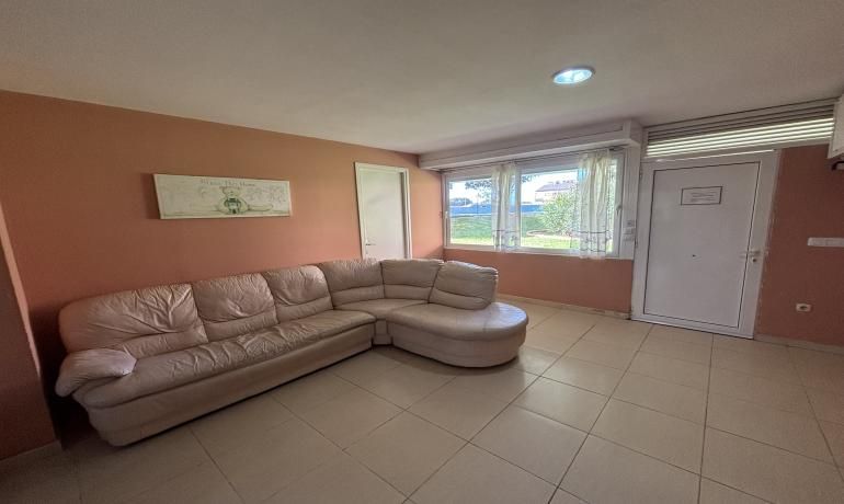 Living room of Planta baja for sale in Roses  with Heating, Private garden and Furnished