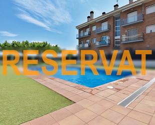 Swimming pool of Planta baja for sale in Pineda de Mar  with Air Conditioner, Heating and Private garden