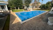 Swimming pool of House or chalet for sale in Dos Hermanas  with Air Conditioner, Private garden and Swimming Pool