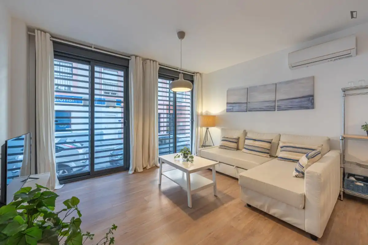 Sala d'estar de Estudi de lloguer en Málaga amb Aire condicionat, Moblat i Forn