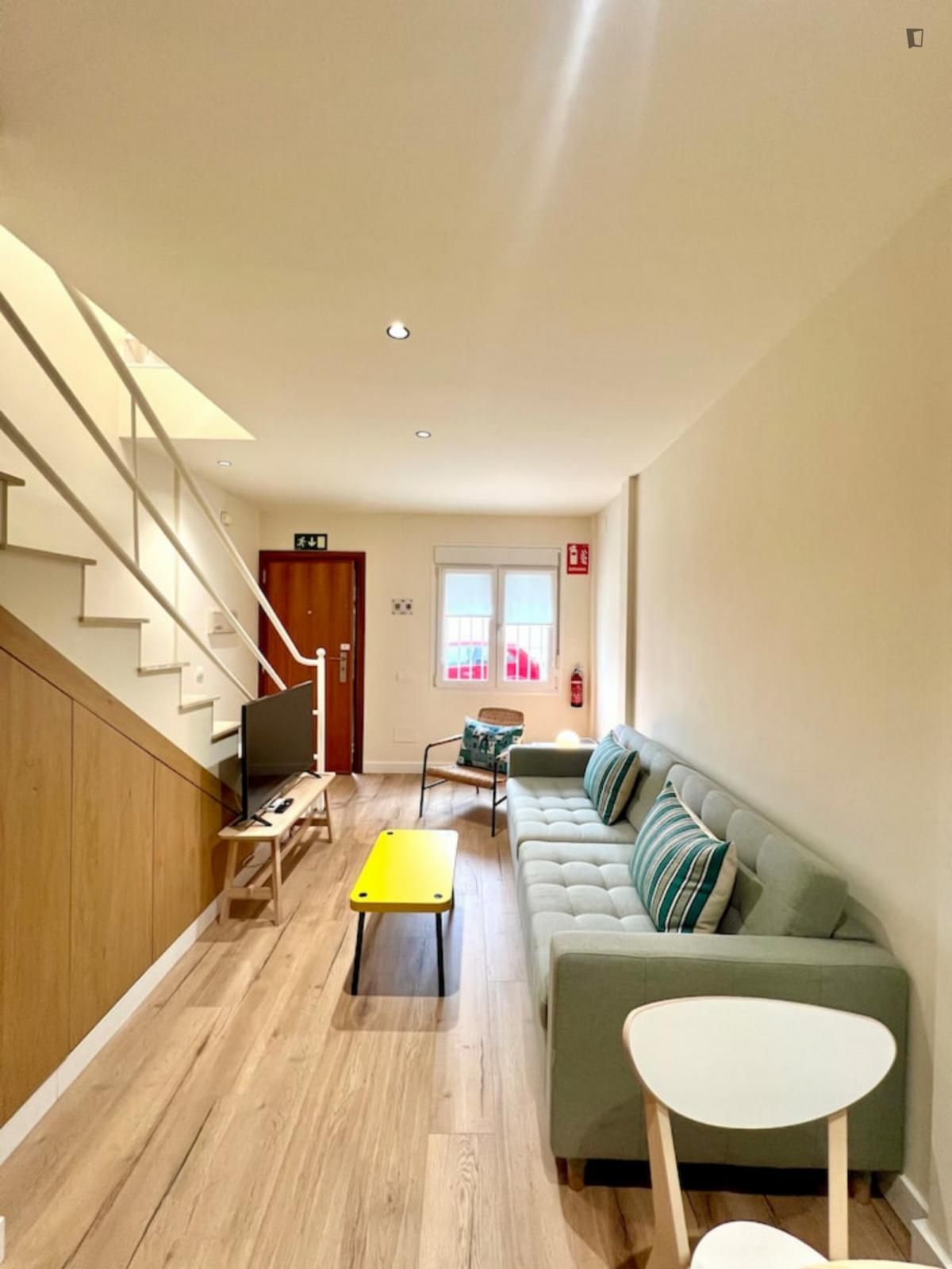 Sala d'estar de Apartament de lloguer en Málaga Capital amb Aire condicionat, Moblat i Forn