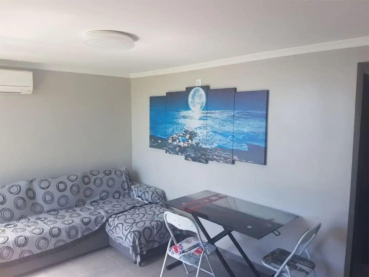 Sala d'estar de Àtic de lloguer en Cullera amb Aire condicionat i Moblat