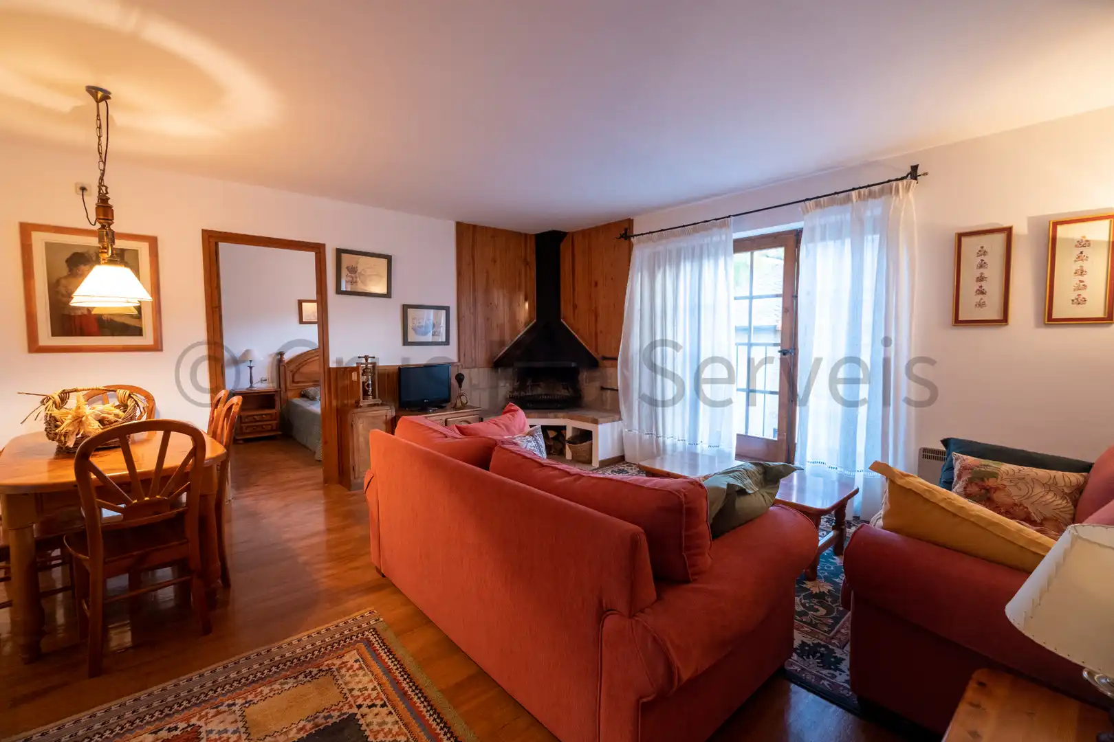 Sala de estar de Casa adosada en venta en Urús con Calefacción, Parquet y Amueblado