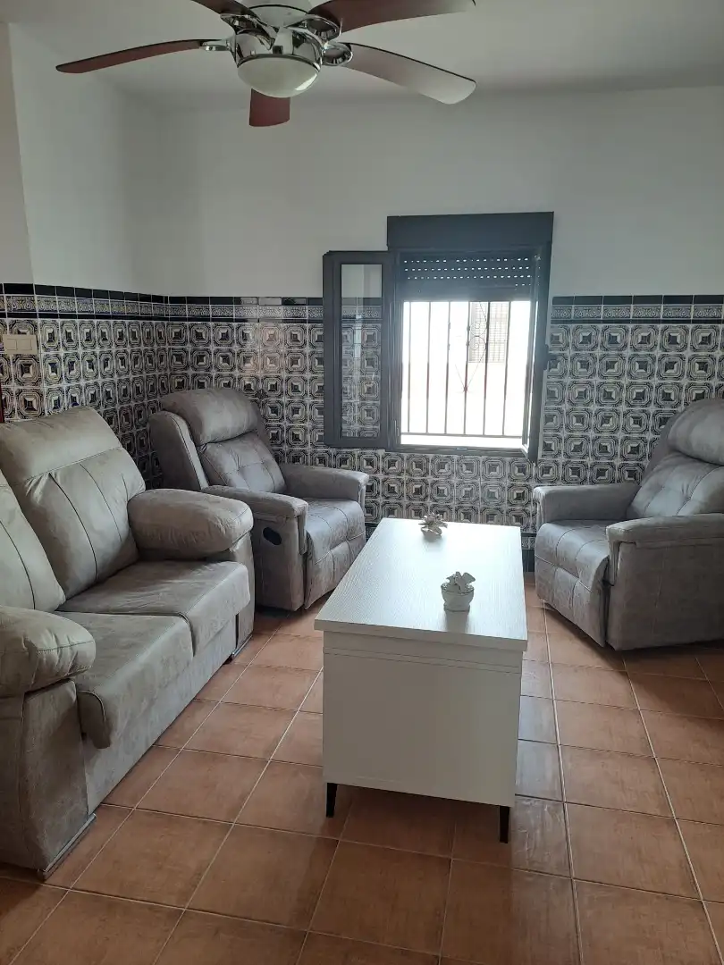 Sala d'estar de Casa adosada en venda en La Puebla de los Infantes amb Aire condicionat i Terrassa
