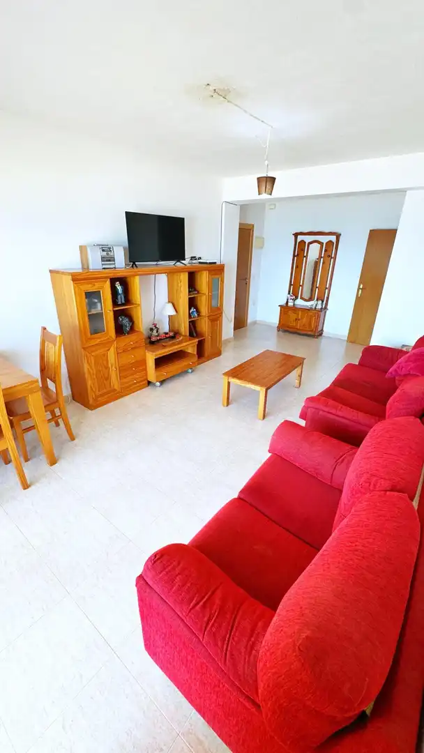 Sala de estar de Apartamento en venta en Gandia con Amueblado, Balcón y Piscina comunitaria