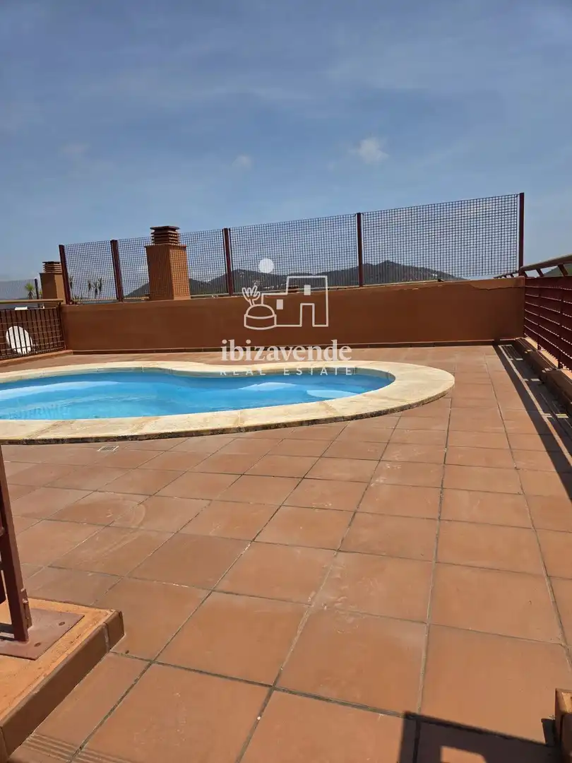 Piscina de Dúplex en venta en Santa Eulària des Riu con Aire acondicionado, Terraza y Trastero