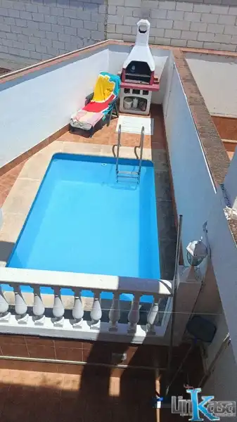 Piscina de Casa adosada en venda en Linares amb Calefacció, Traster i Piscina