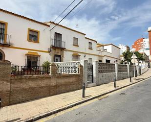 Exterior view of Single-family semi-detached for sale in  Huelva Capital  with Air Conditioner, Private garden and Terrace