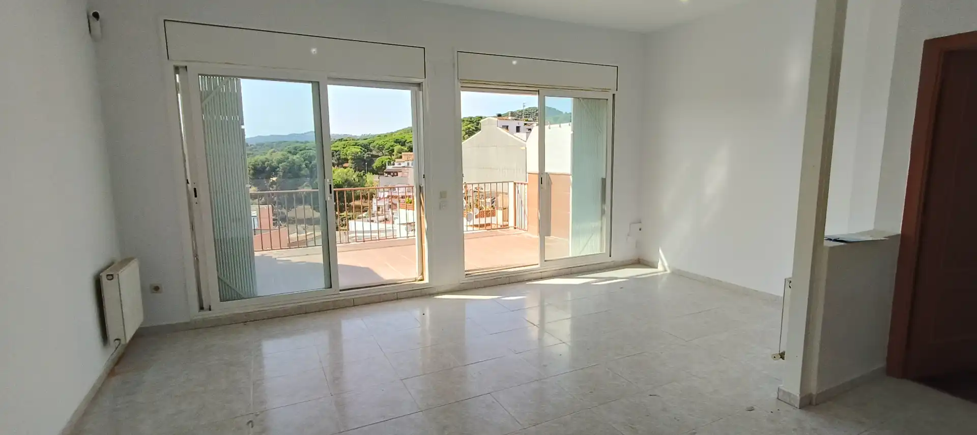 Sala de estar de Casa adosada en venta en Lloret de Mar con Calefacción, Terraza y Balcón