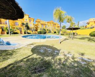 Exterior view of Single-family semi-detached for sale in Estepona  with Air Conditioner, Heating and Community pool