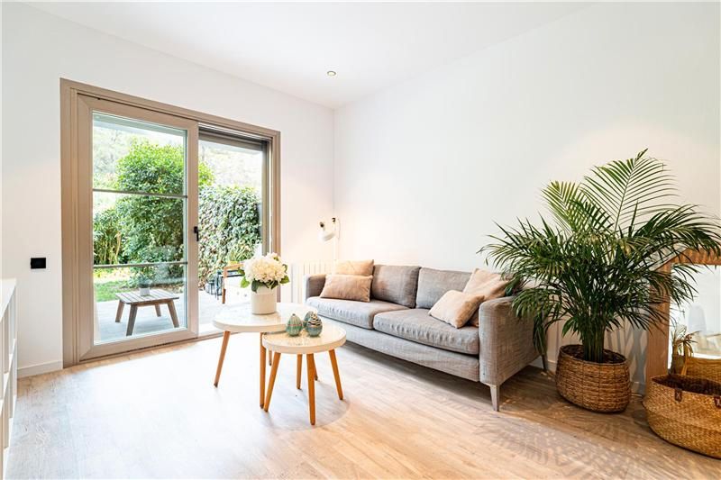 Living room of Planta baja for sale in  Palma de Mallorca  with Air Conditioner, Private garden and Terrace