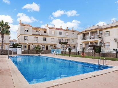 Piscina de Casa adosada en venda en Orihuela amb Terrassa, Moblat i Piscina comunitària
