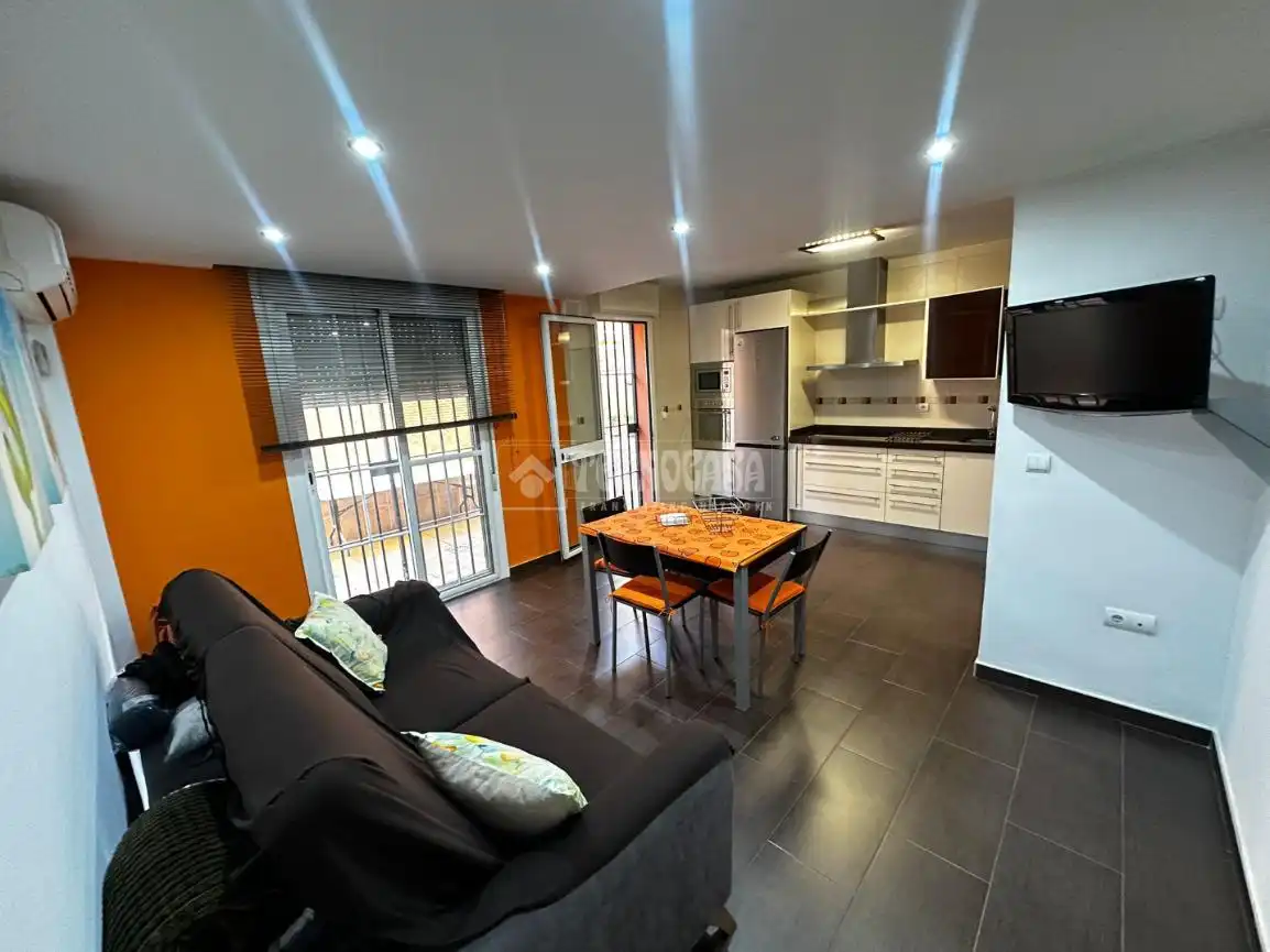 Sala de estar de Casa adosada en venta en Málaga con Aire acondicionado, Jardín privado y Terraza