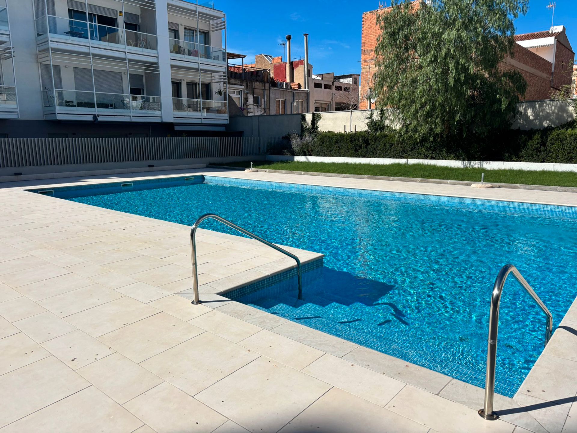 Swimming pool of Flat for sale in Badalona  with Air Conditioner, Heating and Parquet flooring