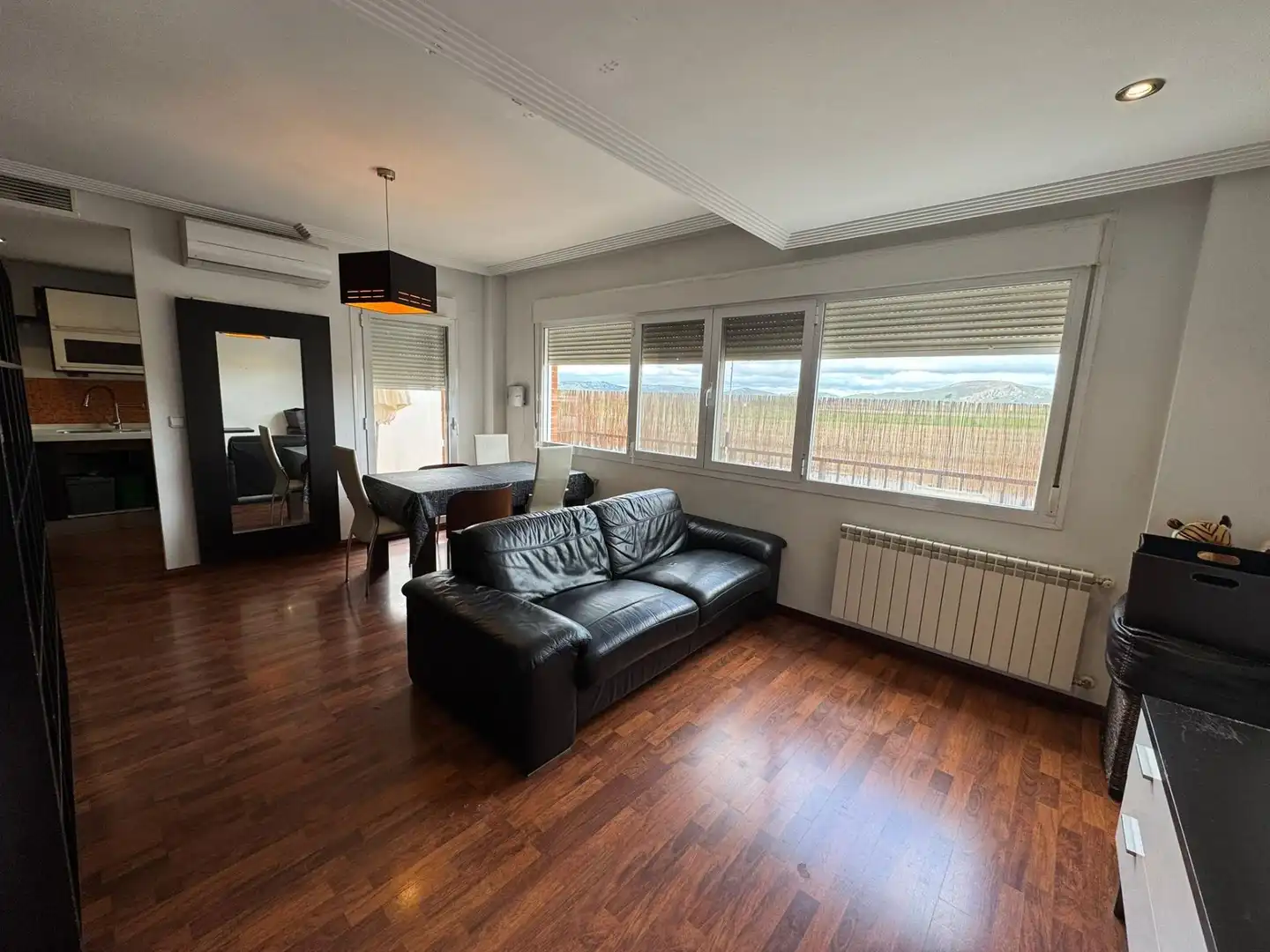 Sala de estar de Casa adosada en venta en Poblete con Aire acondicionado, Calefacción y Jardín privado