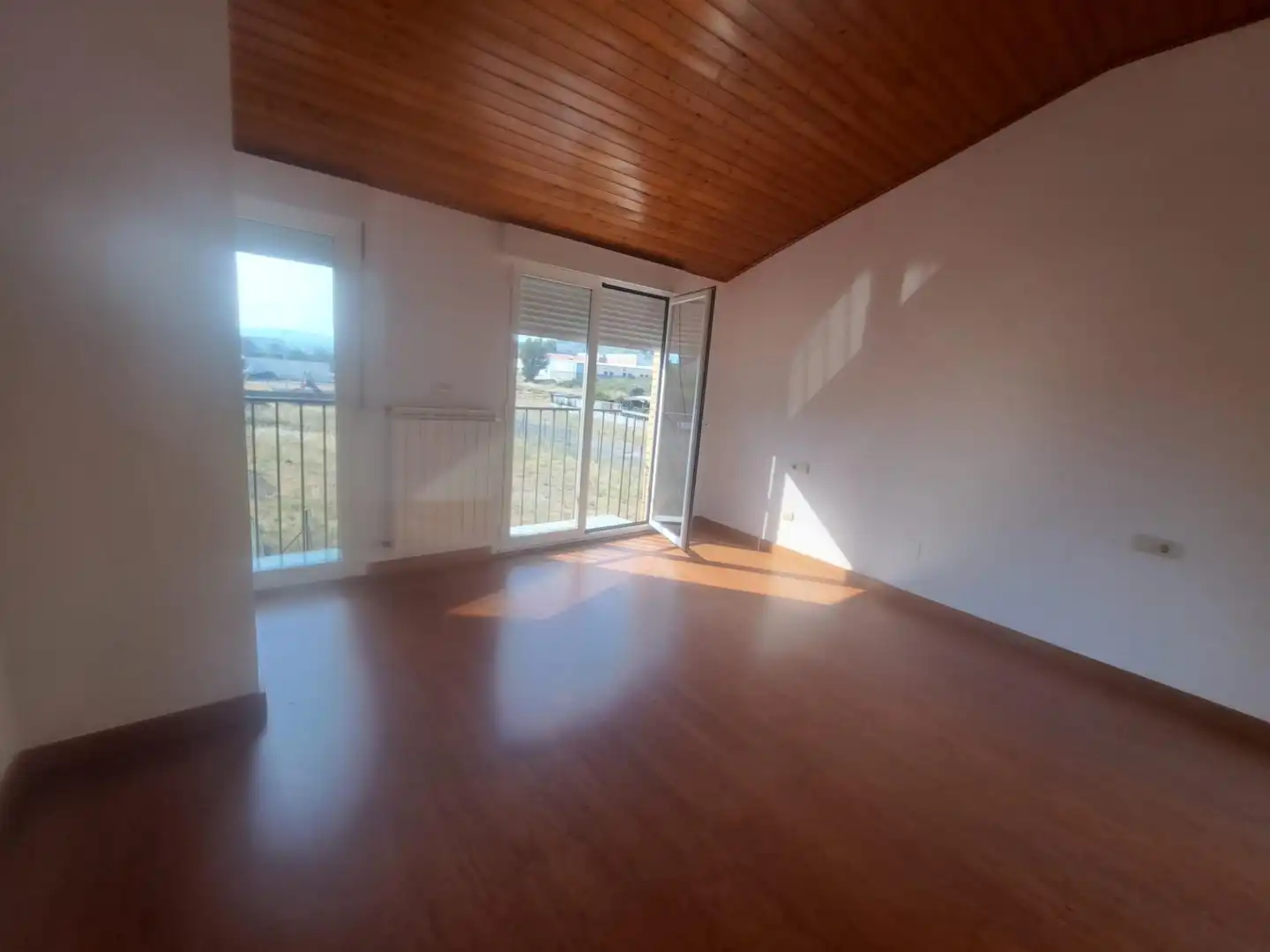 Sala de estar de Casa adosada en venta en Bembibre con Calefacción, Terraza y Balcón