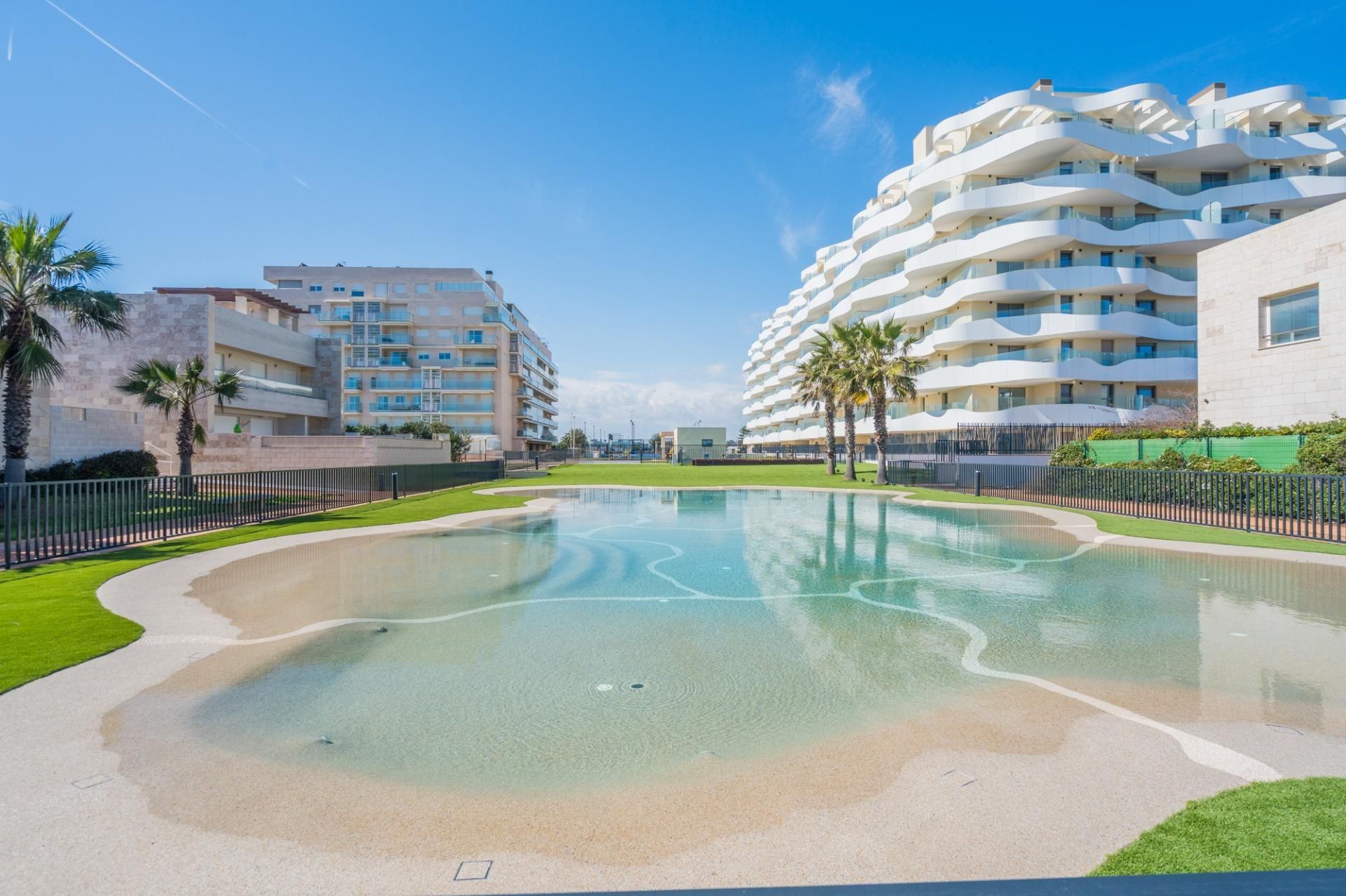 Schwimmbecken von Wohnung zum Verkauf in El Puig de Santa Maria mit Klimaanlage, Privatgarten und Terrasse