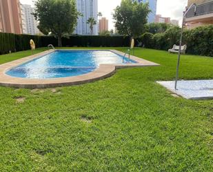 Swimming pool of Flat for sale in Benidorm  with Air Conditioner, Private garden and Terrace