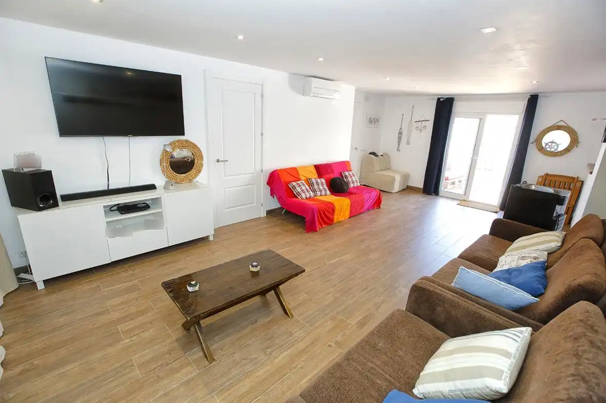 Sala de estar de Casa adosada en venta en Alcanar con Calefacción, Jardín privado y Terraza