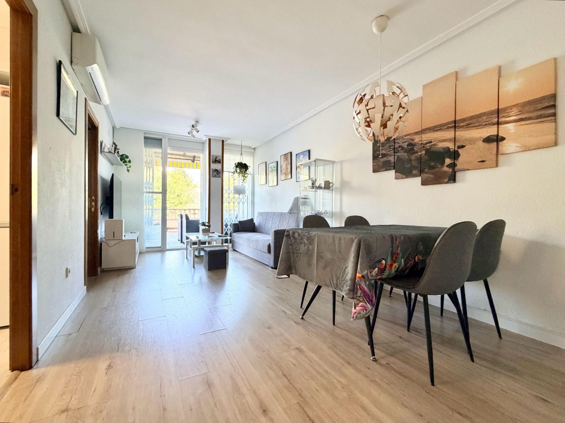 Living room of Planta baja for sale in Calafell  with Air Conditioner and Storage room
