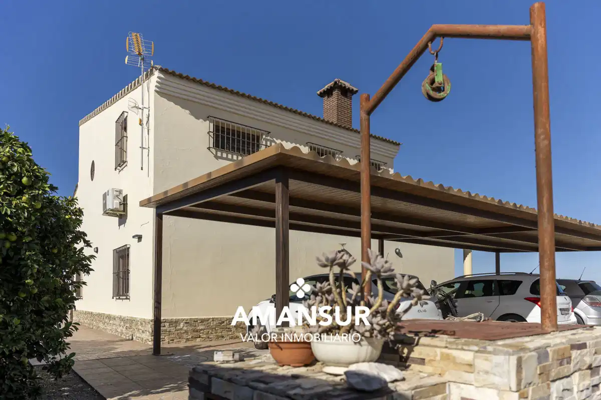 Vista exterior de Casa o xalet en venda en Villarrasa amb Aire condicionat, Calefacció i Jardí privat