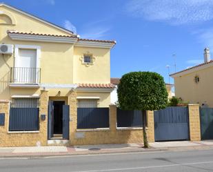 Exterior view of Single-family semi-detached for sale in Bollullos de la Mitación  with Air Conditioner, Parquet flooring and Storage room