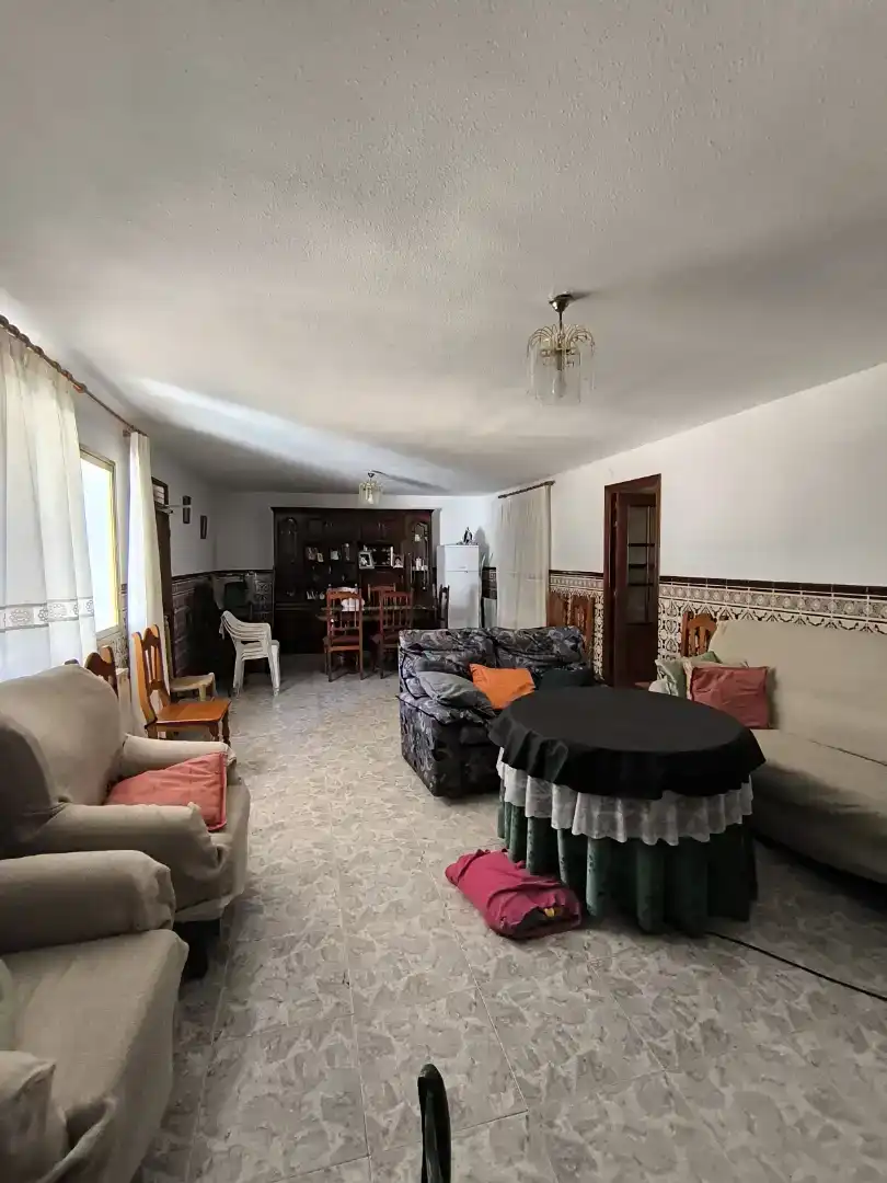 Sala de estar de Casa adosada en venta en El Robledo  