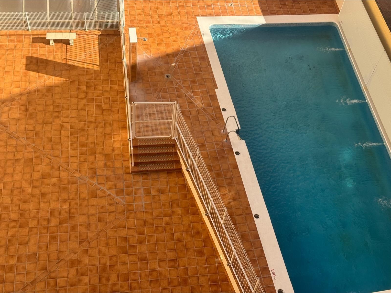 Swimming pool of Flat for sale in Dos Hermanas  with Air Conditioner, Heating and Storage room