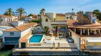 Exterior view of Single-family semi-detached for sale in Empuriabrava  with Air Conditioner and Swimming Pool