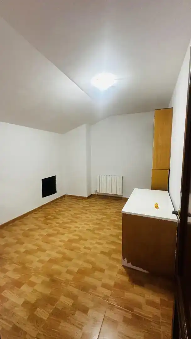 Sala d'estar de Casa adosada en venda en Jaén amb Aire condicionat i Balcó
