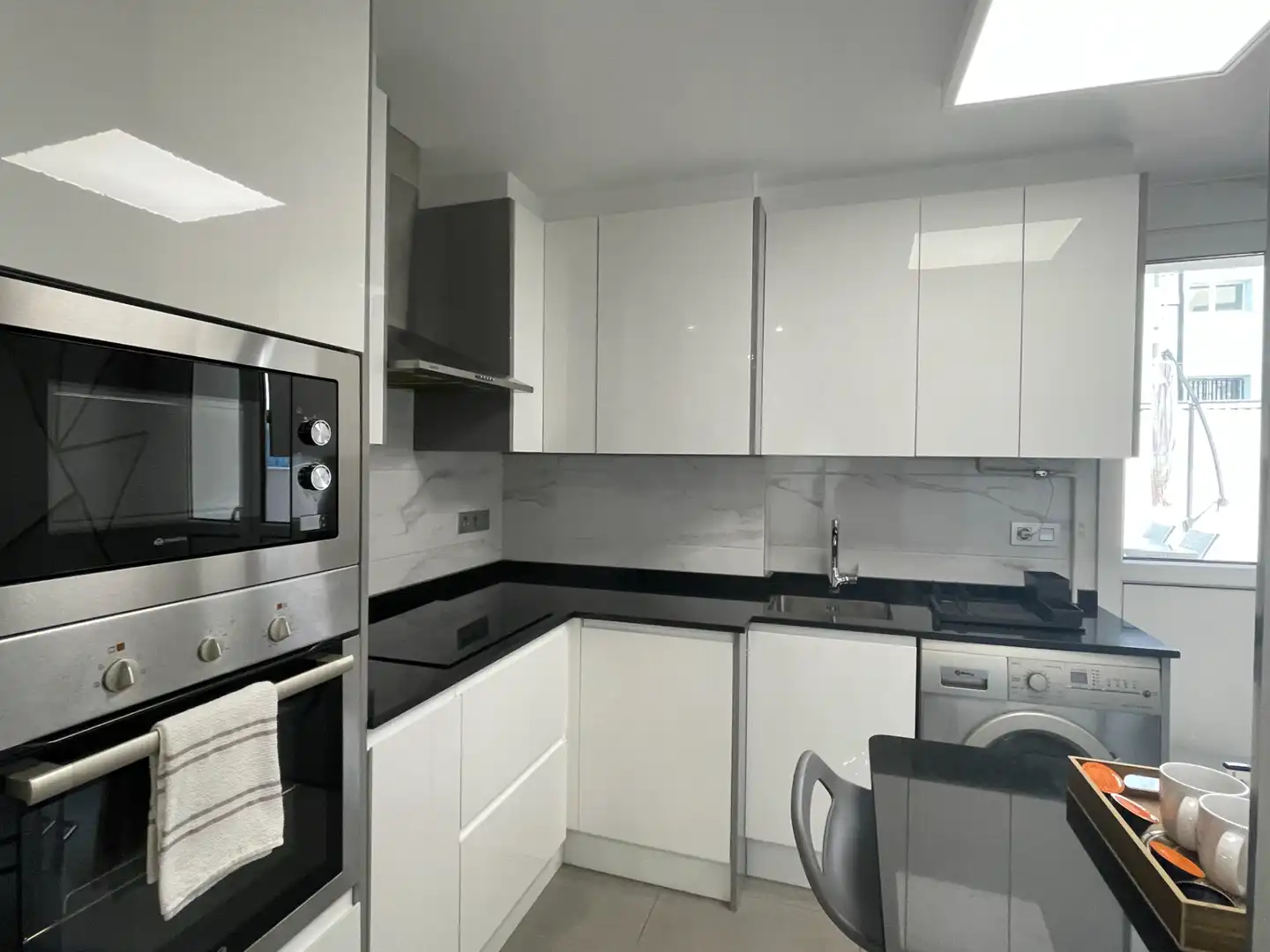 Kitchen of Flat for rent in Gijón   with Heating, Terrace and Furnished