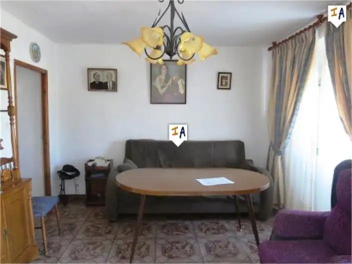 Sala d'estar de Casa adosada en venda en Loja amb Traster