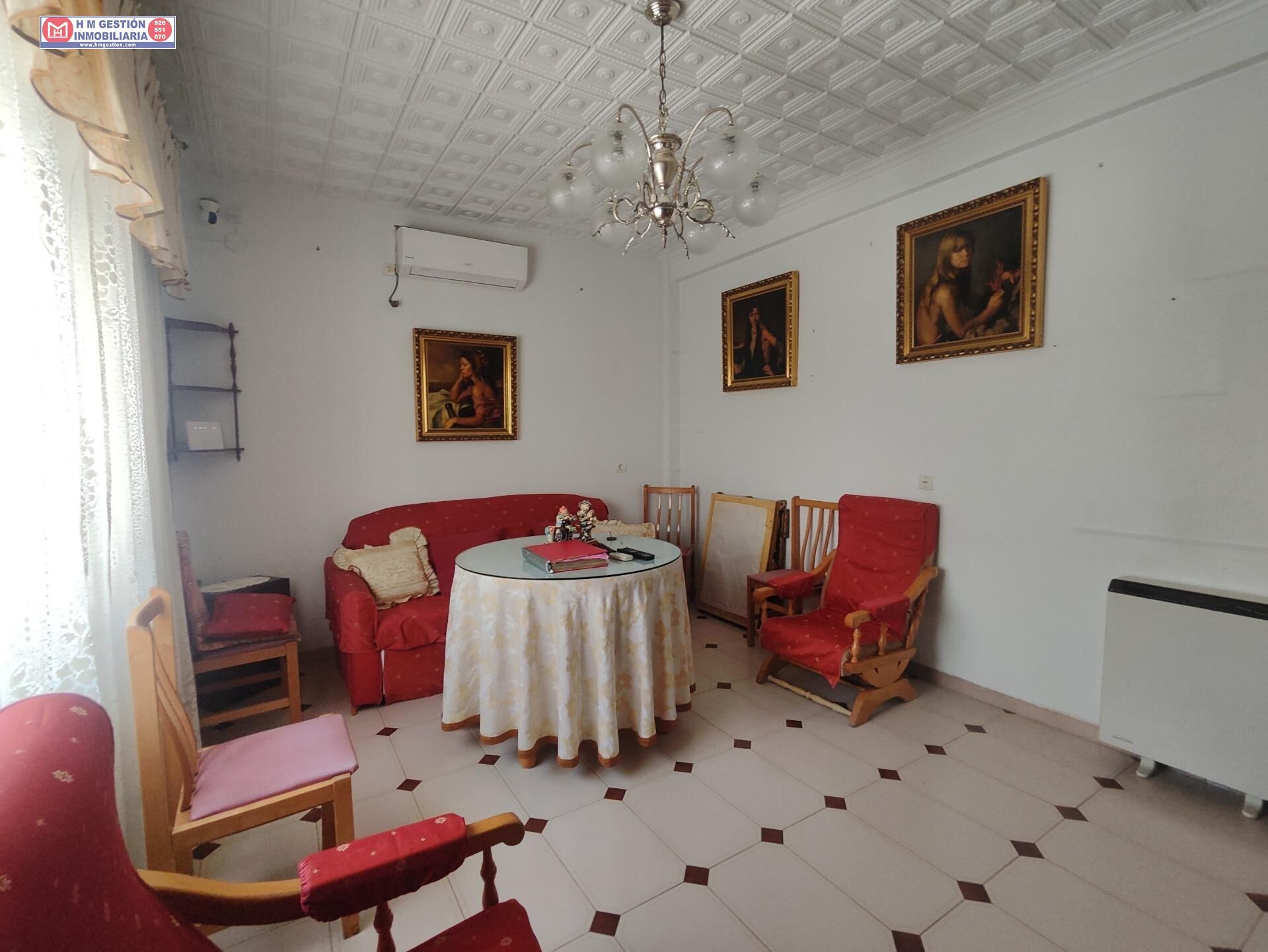 Sala de estar de Casa adosada en venta en Alcázar de San Juan con Aire acondicionado