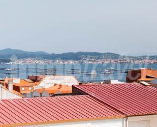 Vista exterior de Dúplex en venda en O Grove   amb Parquet, Terrassa i Traster