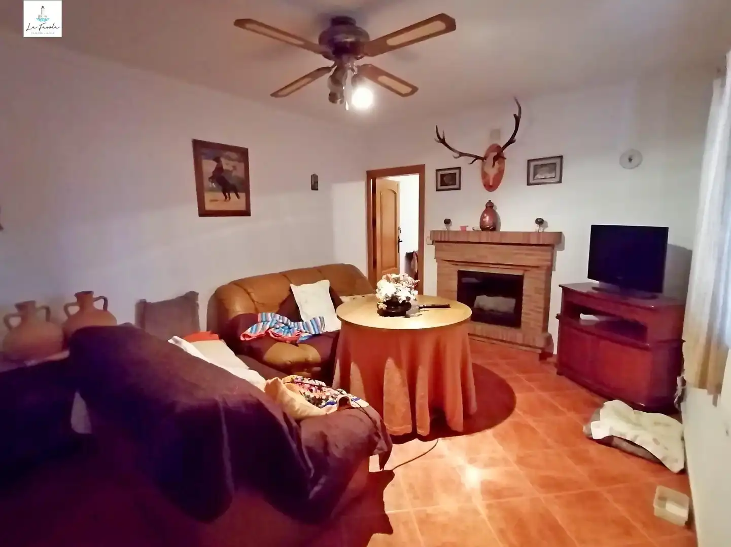 Sala d'estar de Casa o xalet en venda en Villanueva del Trabuco amb Jardí privat, Traster i Moblat