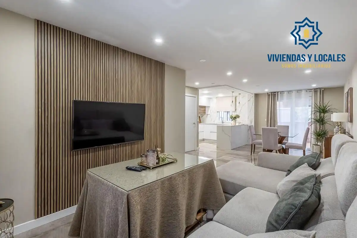 Sala de estar de Casa adosada en venta en Atarfe con Aire acondicionado