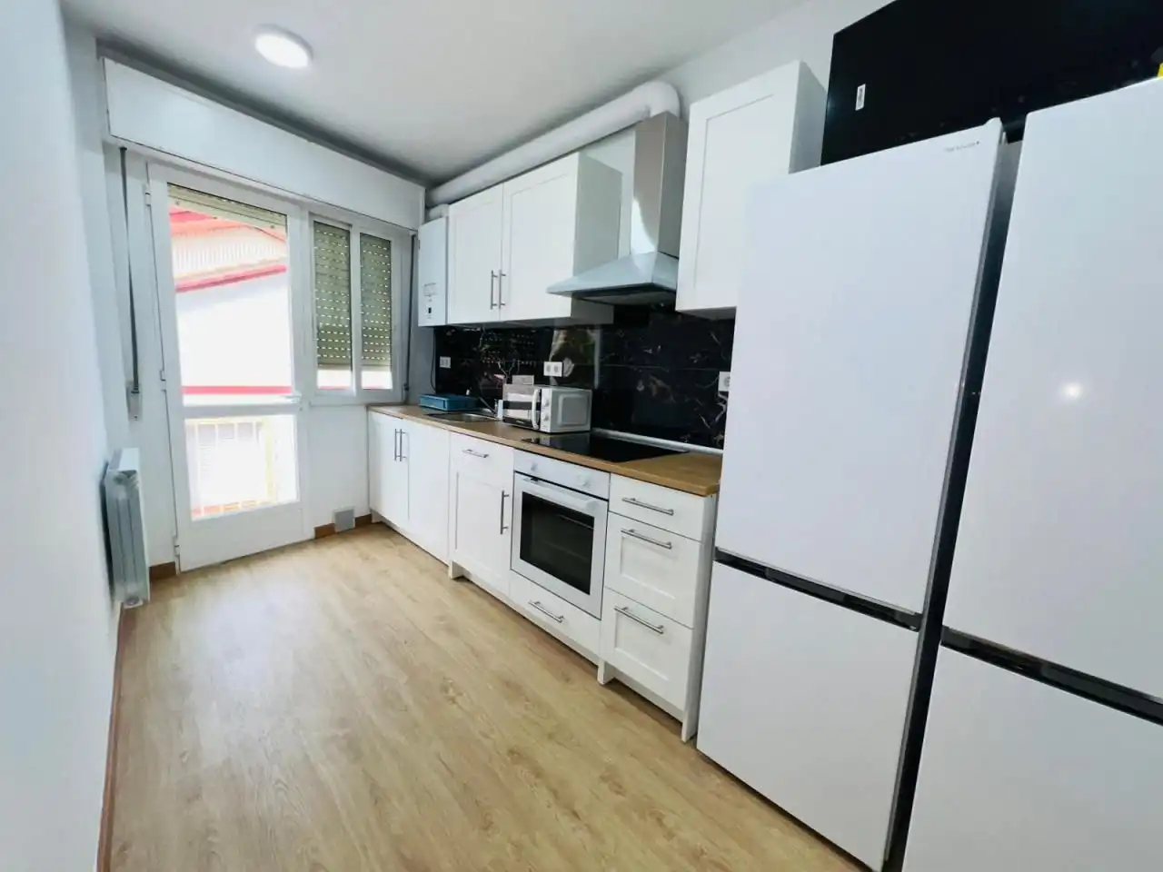 Kitchen of Flat for share in Ourense Capital   with Heating, Furnished and Balcony
