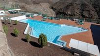 Piscina de Apartament en venda en Mogán amb Aire condicionat, Terrassa i Piscina comunitària