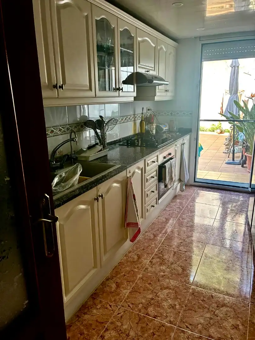 Küche von Einfamilien-Reihenhaus zum Verkauf in Canet de Mar mit Heizung, Terrasse und Ofen
