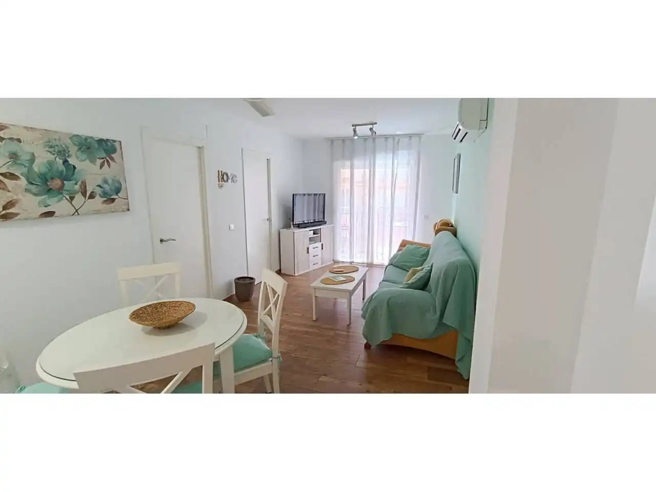Sala de estar de Piso en venta en Roquetas de Mar con Aire acondicionado, Trastero y Amueblado