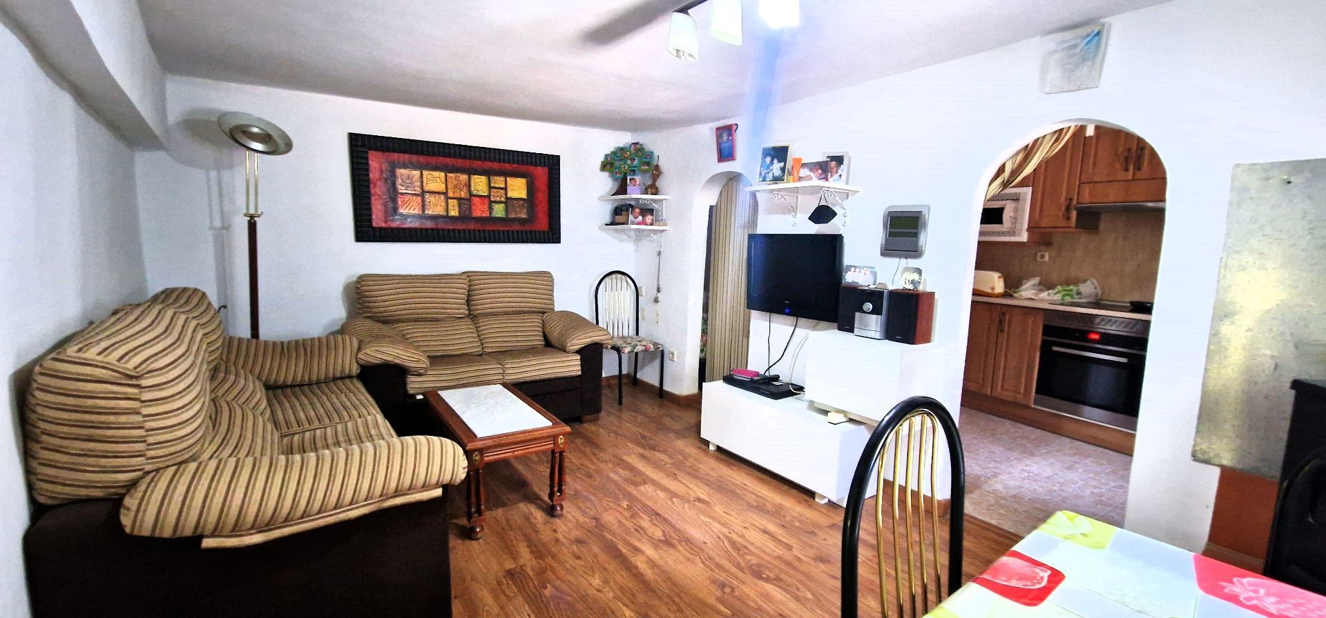 Wohnzimmer von Einfamilien-Reihenhaus zum Verkauf in Jarandilla de la Vera mit Klimaanlage, Terrasse und Möbliert