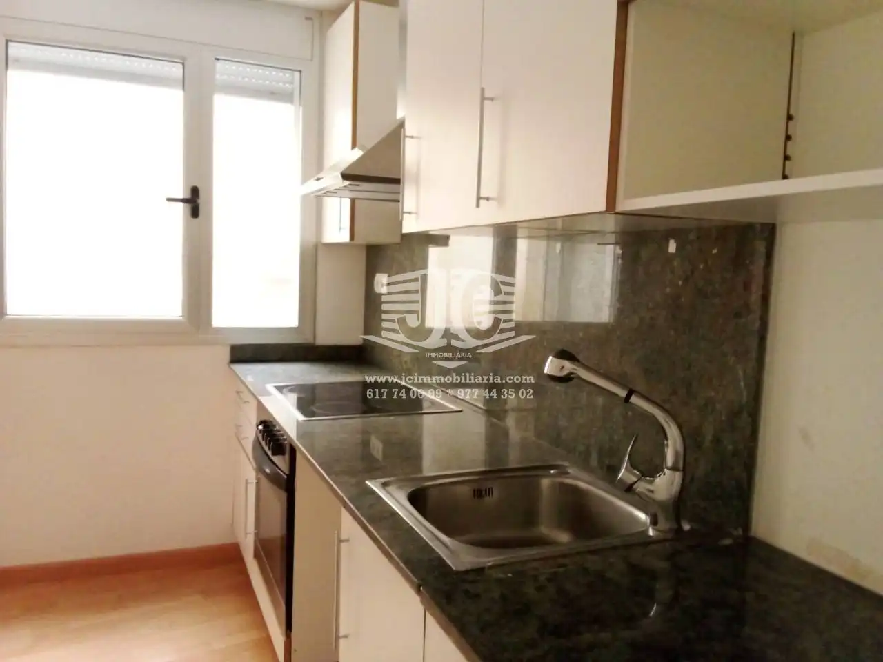 Cuina de Dúplex en venda en L'Ampolla amb Aire condicionat, Parquet i Terrassa