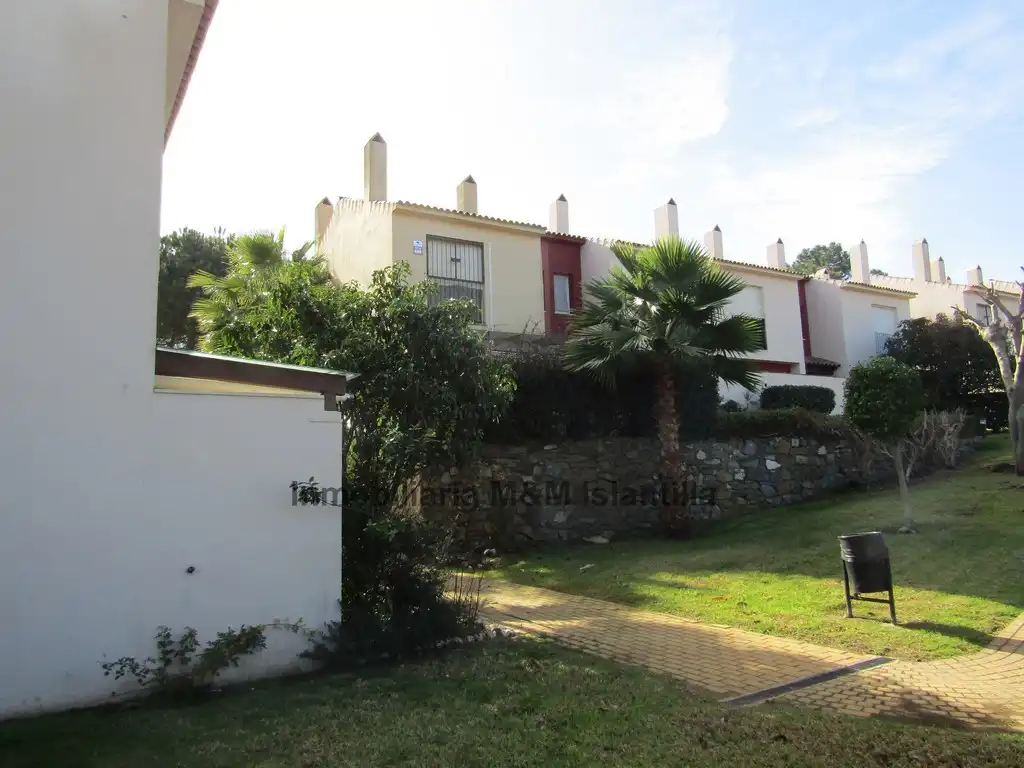 Vista exterior de Casa adosada en venta en Islantilla con Jardín privado, Terraza y Amueblado