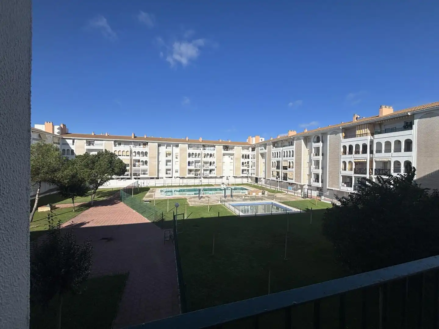 Vista exterior de Piso de alquiler en El Portil con Jardín privado, Terraza y Piscina