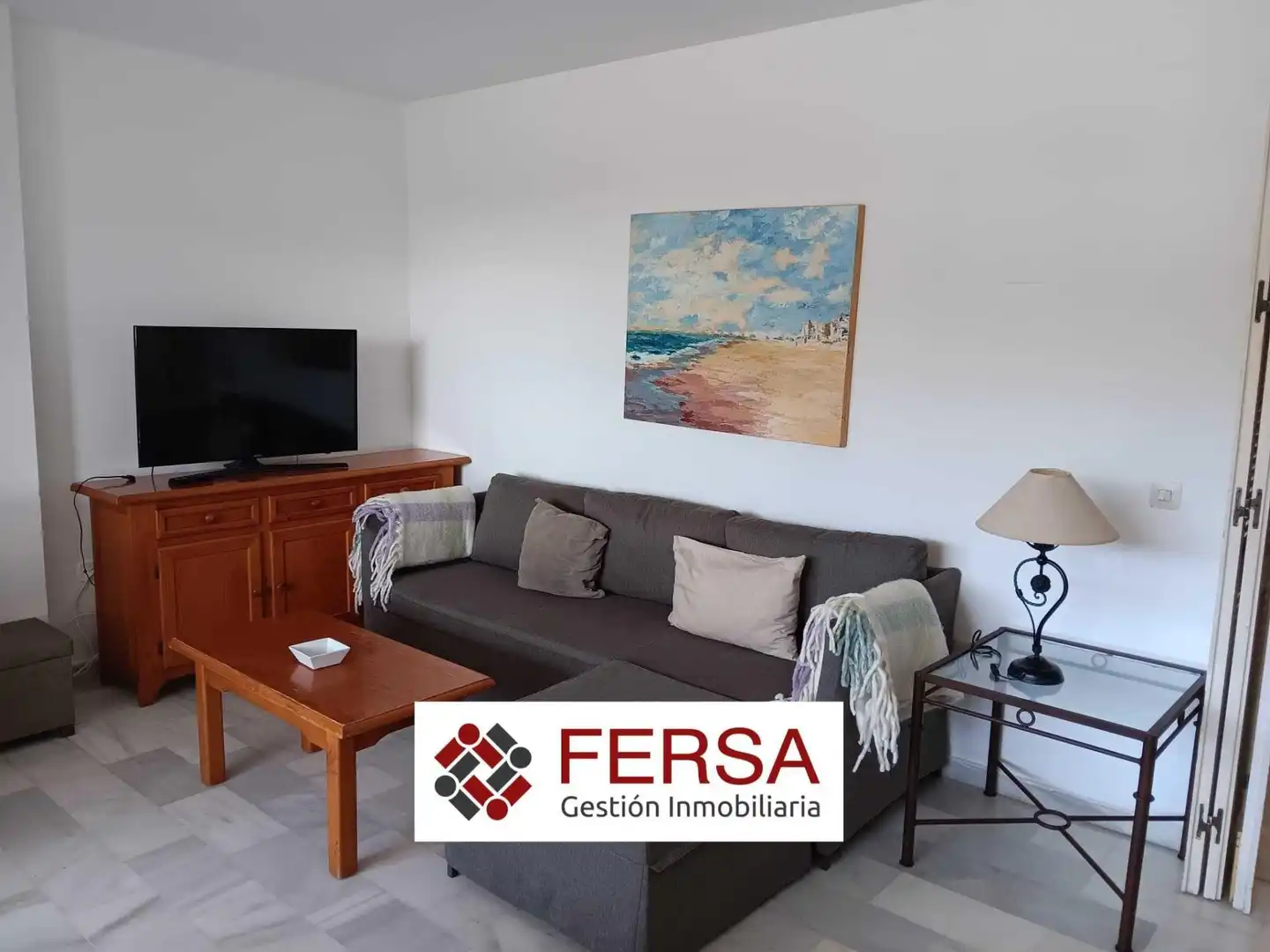 Sala d'estar de Apartament de lloguer en El Puerto de Santa María amb Jardí privat, Terrassa i Moblat