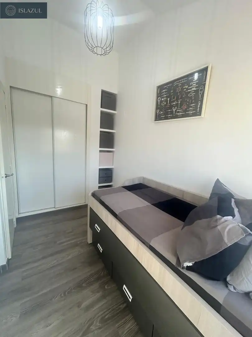 Dormitori de Apartament en venda en Isla Cristina amb Aire condicionat, Jardí privat i Terrassa